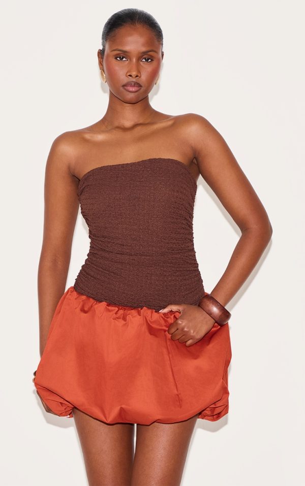 e0a85c2addefc6192c72d389525c55809f2a8deb_CNM3513_4_rust_cotton_puffball_mini_skirt