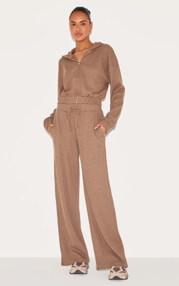 e1d8d73ee994c3508b35b1c4d67782c5521d02f0_CNM0141_1_brown_waffle_wide_leg_trousers