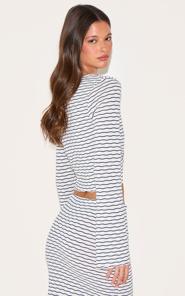 e5275b10de622e88e687d20db9f23076a18be5a6_CNM7409_2_navy_textured_striped_button_cardigan-1