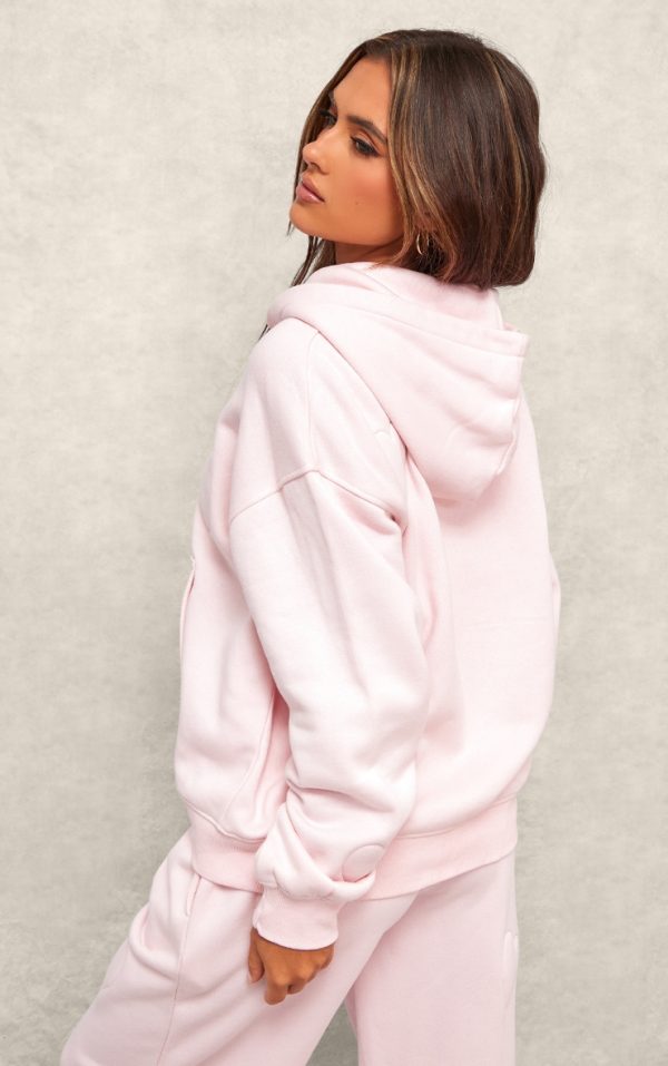 e852bdf8f46460de743ae3d54104b0aedced85e2_CNJ8738_2_baby_pink_embossed_heart_zip_up_hoodie