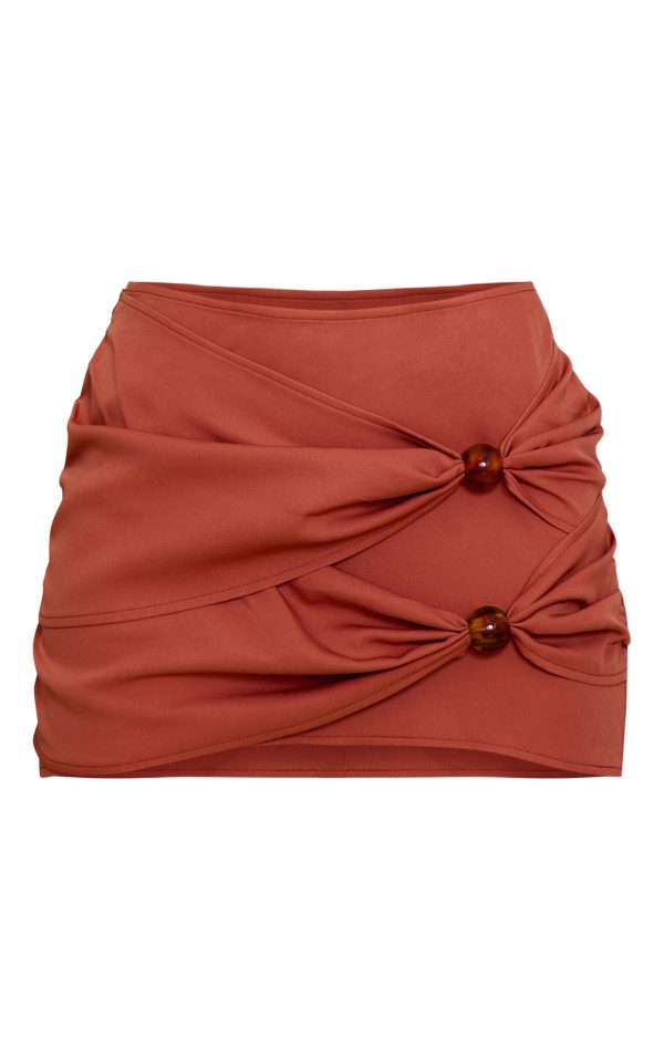 e947bb6a70d1de7f0aa671916deeda48dee228aa_CNM6158_6_rust_bead_detail_mini_skirt