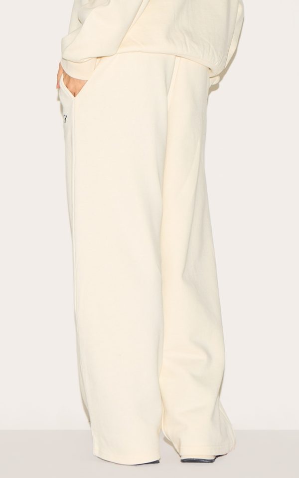 eb8188cc709f39a04abaf2a2da199a778c3bcc49_CNM0211_3_cream_premium_norway_wide_leg_joggers