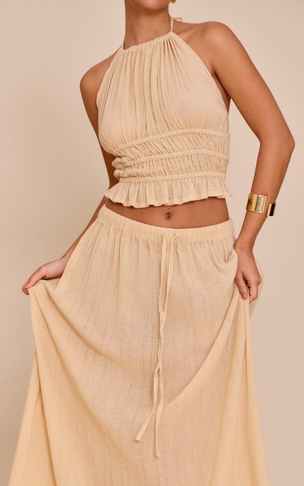 ecebd15678cc23a94244121d3ed49f207d41ecbe_CNM6322_4_sand_mid_rise_textured_maxi_skirt
