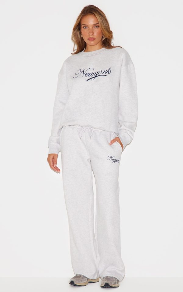 f19af64c3205ae9964381c24c1655ecaf73e66bc_CNL9633_1_cream_new_york_embroidered_wide_leg_joggers