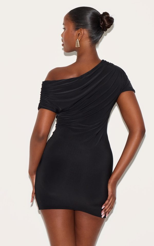 f7835e30bdf72d19485a78bc8f54dc7607d5b8fd_CNM2988_2_black_slinky_off_the_shoulder_ruched_mini_dress