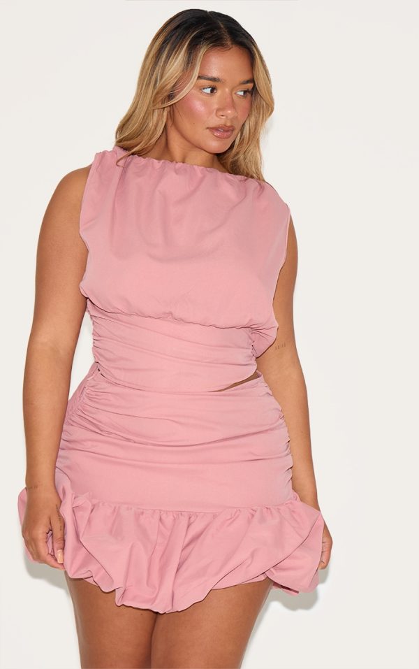f9482f74b4035bd1321aeb9b14d8f8d28588bcce_CNM6474_1_shape_rose_ruched_dropped_hem_puffball_mini_skirt