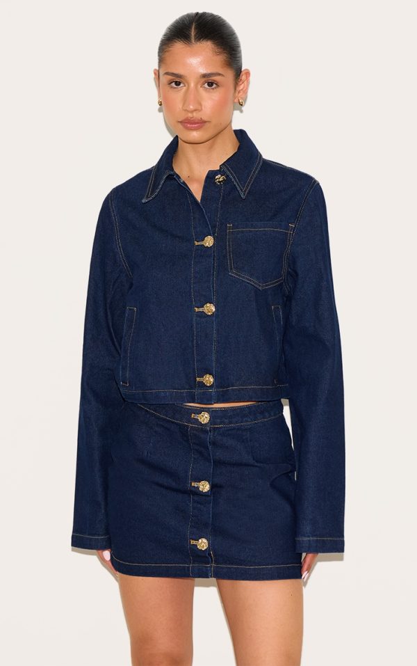 fbceb1db7ef6a80ea63d09f82d44ac75671c6581_CNM4540_1_tall_dark_indigo_button_trim_denim_mini_skirt