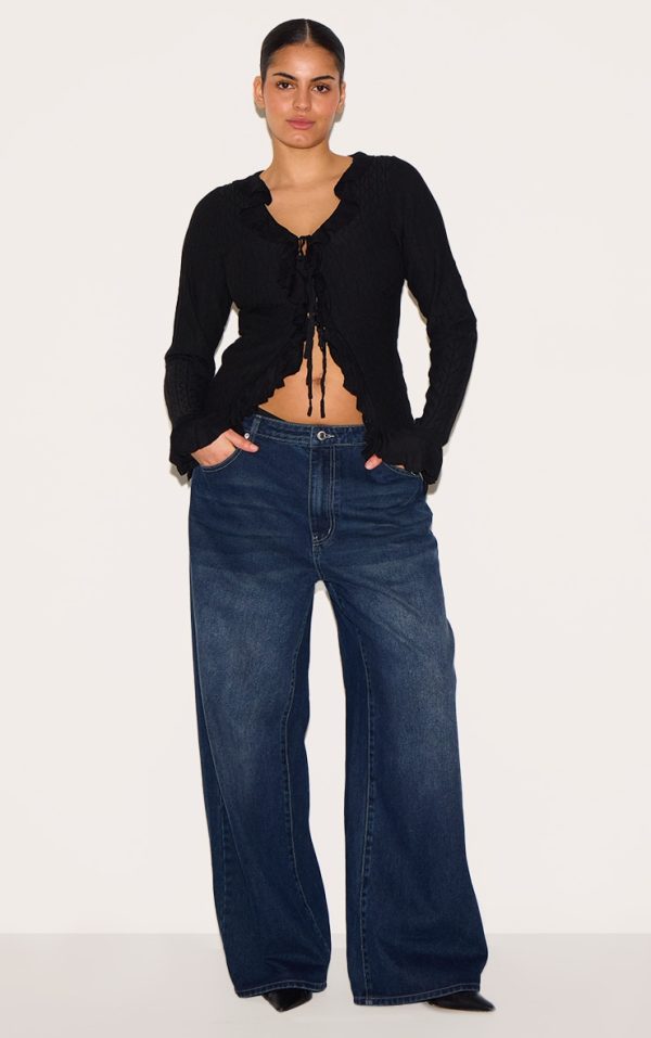 fc3999db4c3ee85cc906a26e0efc9ad5d8ee321b_CNH3152_3_plus_black_textured_knit_frill_detail_tie_front_top