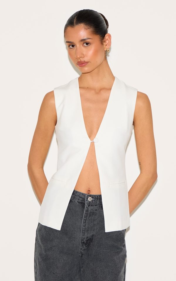 ff58ef0ad6cb88d87522c6fce0f0795bc1b18bdc_CNM1101_1_tall_white_longline_sleeveless_waistcoat