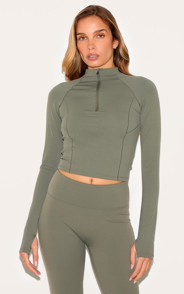 ffd60aaf645607e49c7153170c8456c10d0796b9_CNL6478_1_olive_sculpt_quarter_zip_gym_top